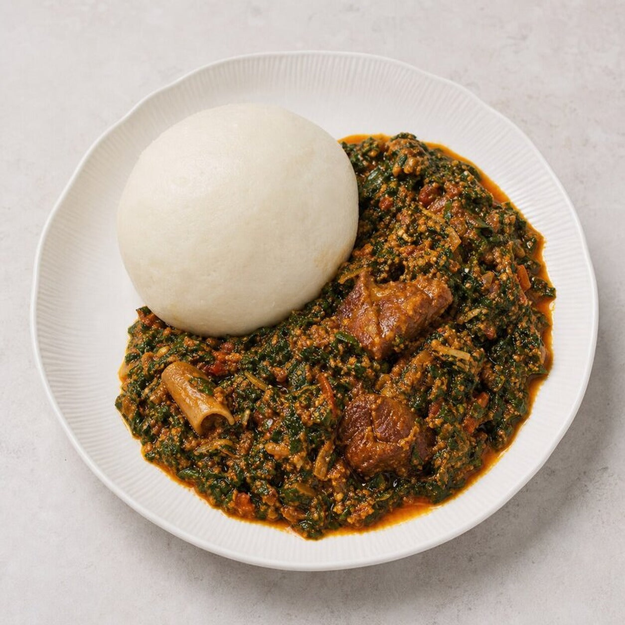 Loaded Egusi/Palava Sauce with Fufu/Yam